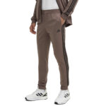 Adidas Tuta Completa Uomo 3 Stripes Essentials Acetata Marrone JD9862 alexanderjohn.it shoes tracksuits AXJN Alexander John